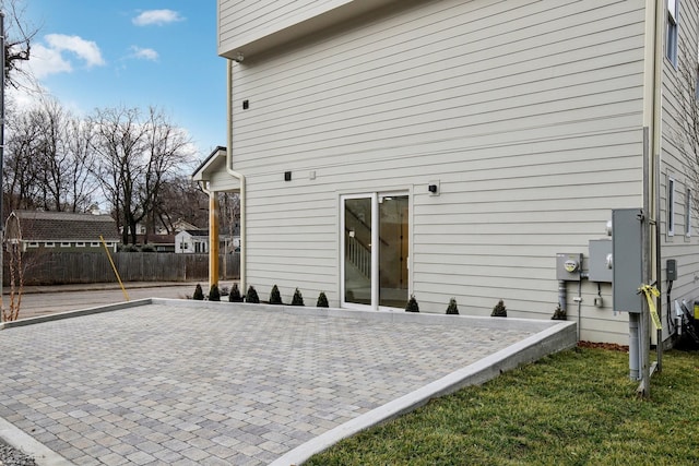 rear view of property featuring a patio