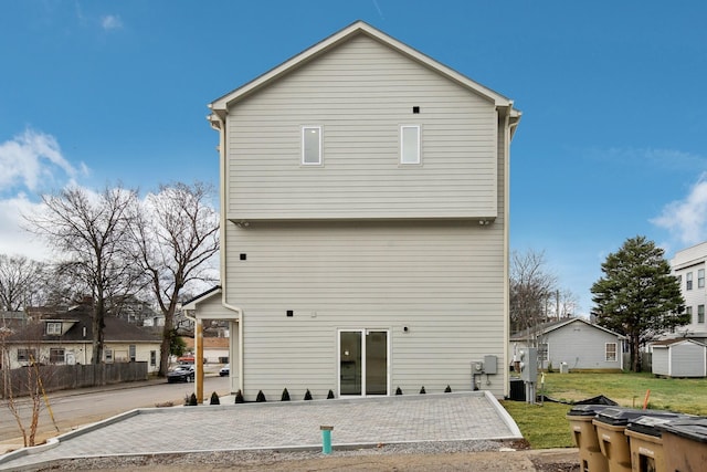 rear view of house featuring a patio