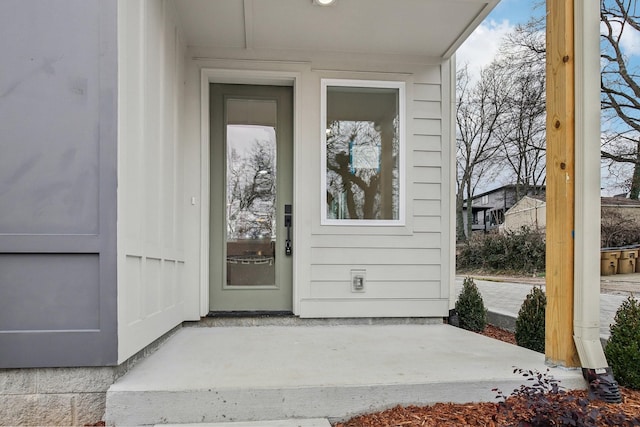 doorway to property featuring a patio