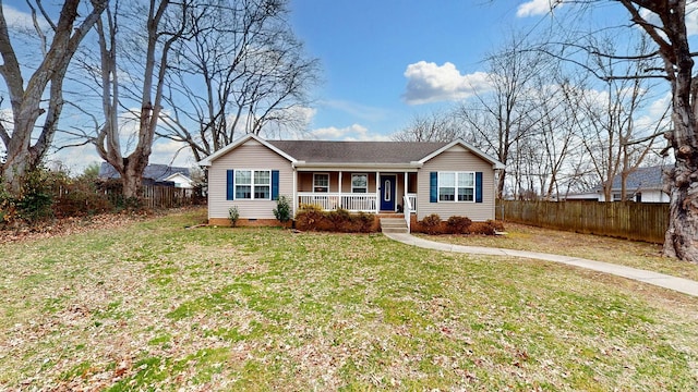 single story home with a front yard and covered porch