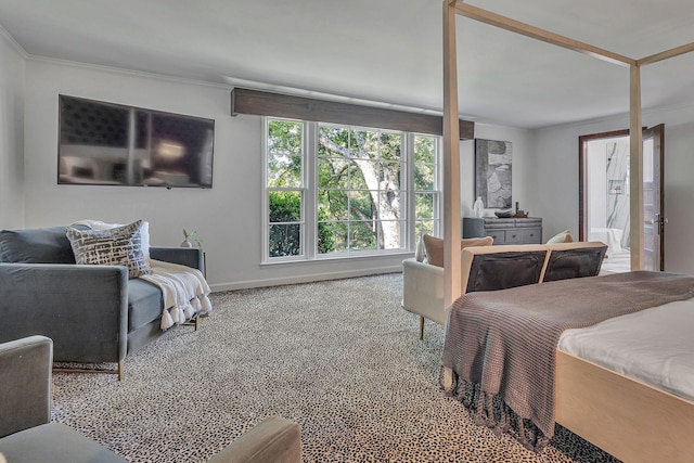 bedroom with carpet floors and ornamental molding