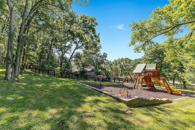 view of jungle gym with a lawn