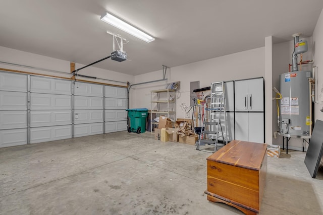 garage with a garage door opener and water heater