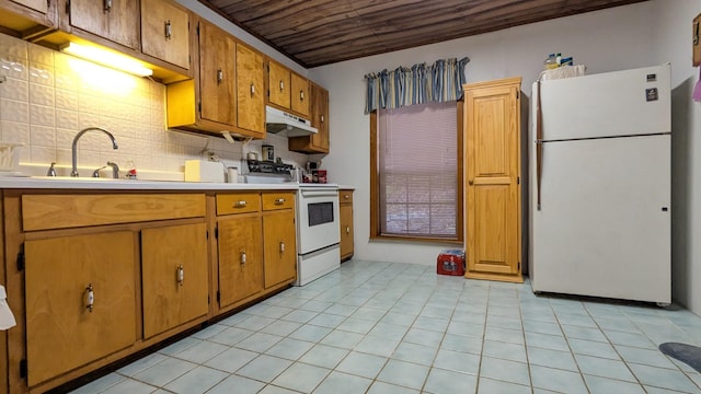 kitchen featuring sink, backsplash, light tile patterned floors, wood ceiling, and white appliances