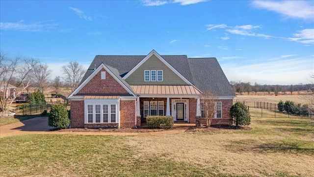 view of front of house featuring a front lawn