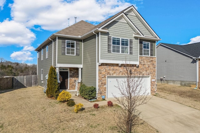 craftsman-style house featuring a garage and a front lawn