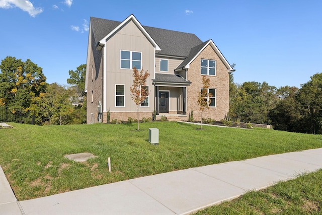 view of front of property featuring a front yard