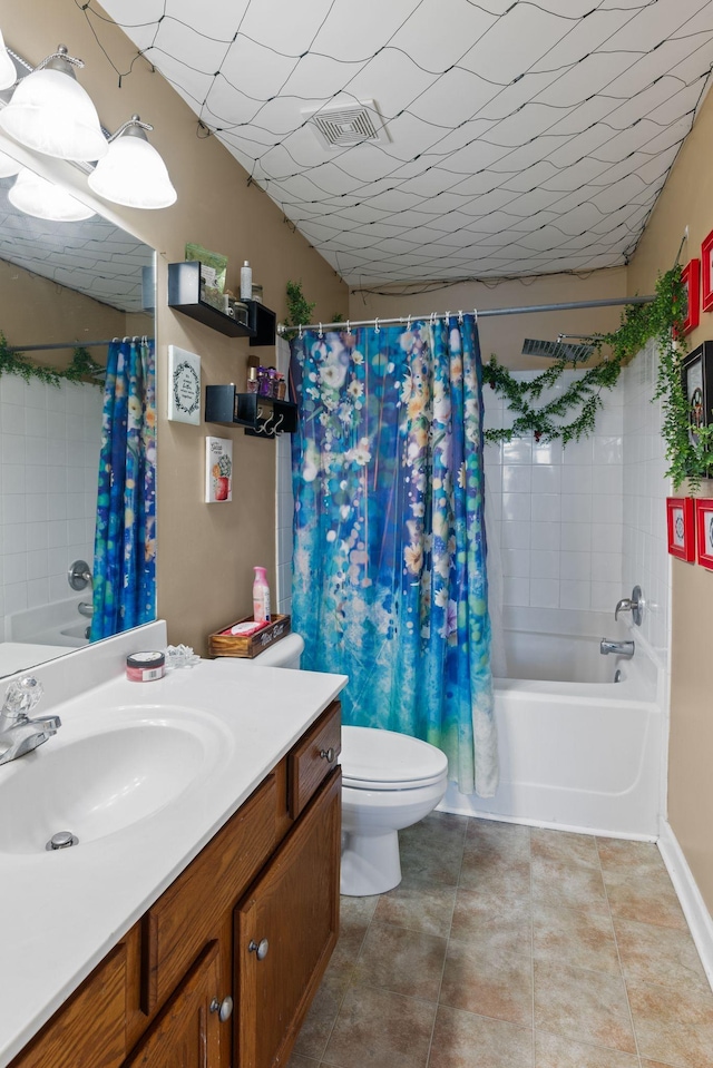 full bathroom with tile patterned flooring, vanity, shower / bathtub combination with curtain, and toilet