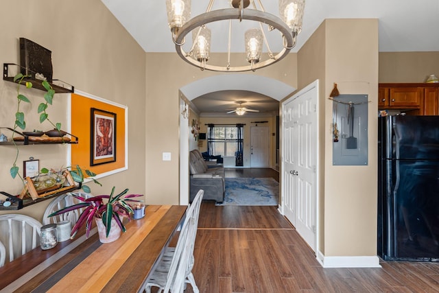 hall with a chandelier, electric panel, and dark hardwood / wood-style flooring