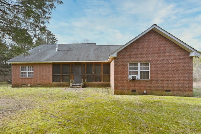 rear view of property featuring a lawn, cooling unit, and a sunroom