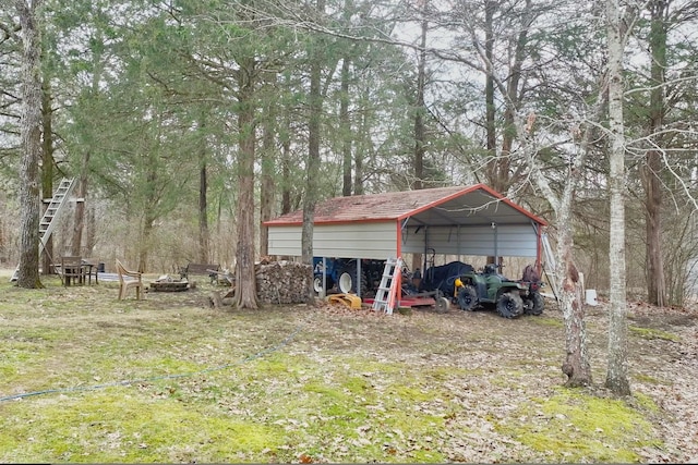 view of outbuilding featuring a carport