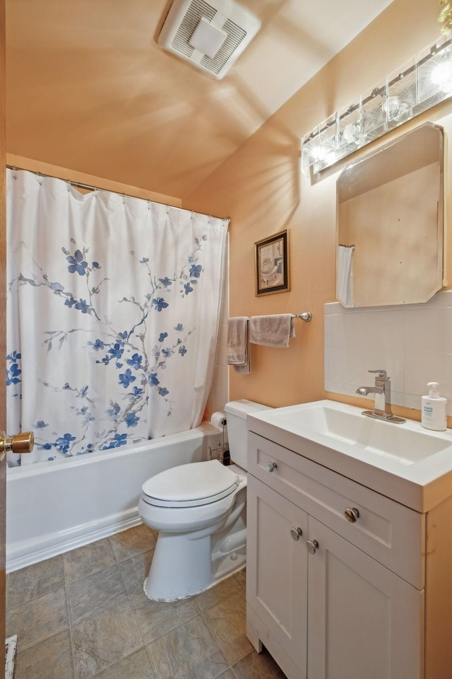 full bathroom with shower / bath combination with curtain, vanity, toilet, and decorative backsplash