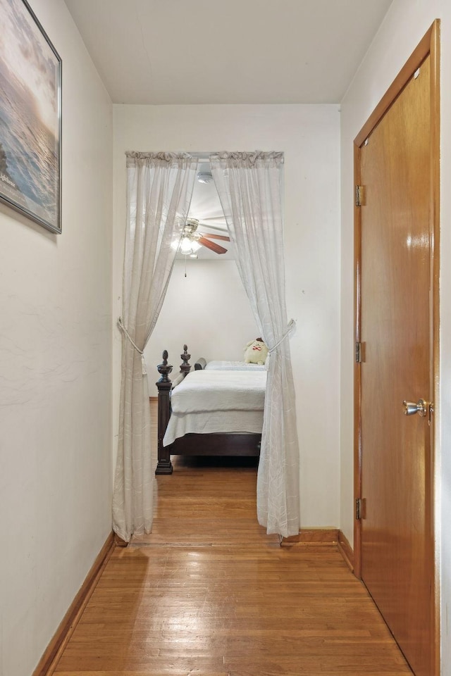 bedroom featuring wood-type flooring