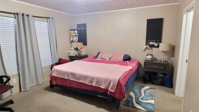 carpeted bedroom featuring crown molding and a textured ceiling