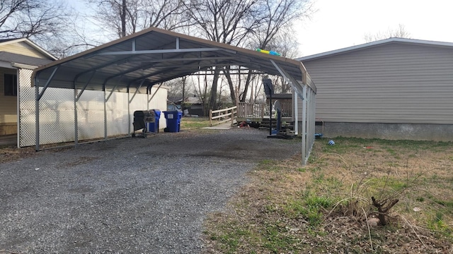 view of vehicle parking featuring a carport