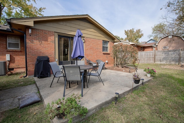 view of patio with a grill