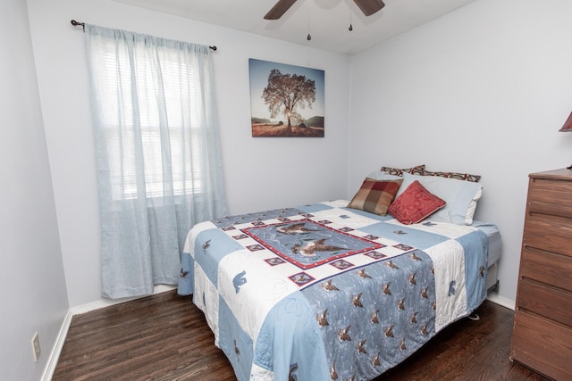 bedroom featuring ceiling fan and dark hardwood / wood-style flooring