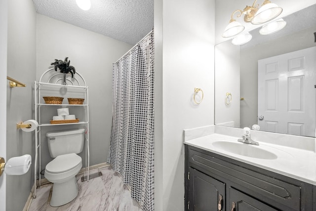 bathroom with vanity, toilet, a shower with shower curtain, and a textured ceiling