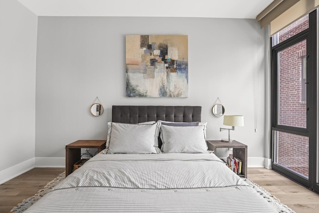 bedroom featuring light wood-type flooring