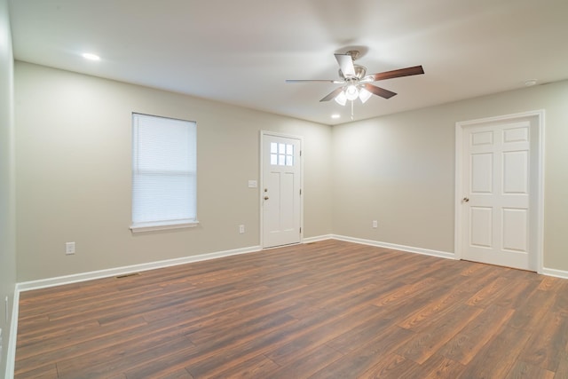 entrance foyer featuring dark hardwood / wood-style flooring and ceiling fan