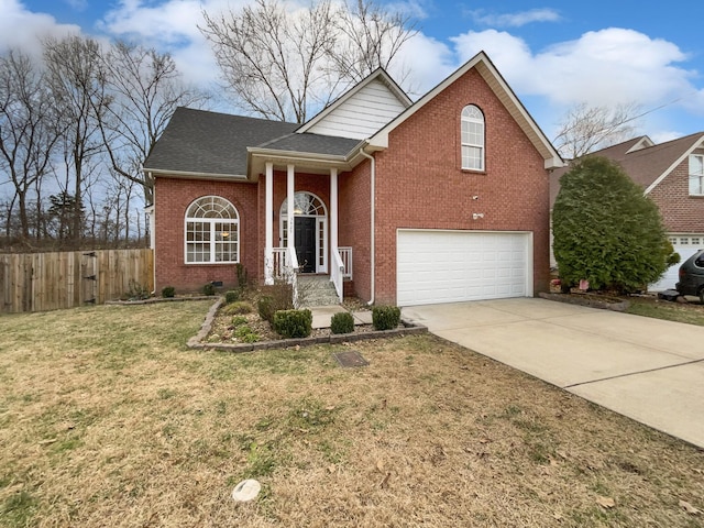 view of front of home with a garage and a front yard