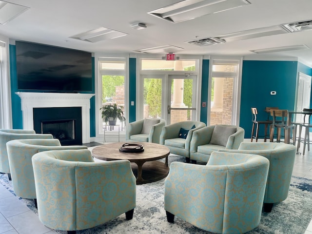 living room with light tile patterned floors