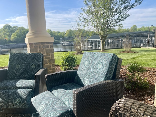 view of patio / terrace with a water view