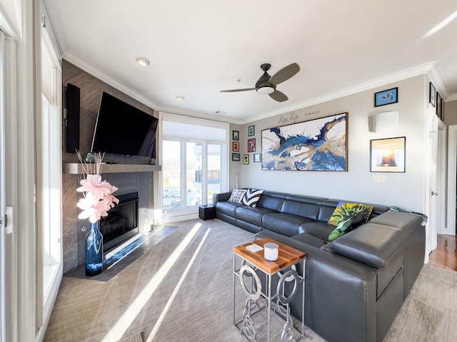 400 Warioto Way Unit 716, Ashland City, TN 37015 - carpeted living area featuring crown molding, ceiling fan, a fireplace, and baseboards