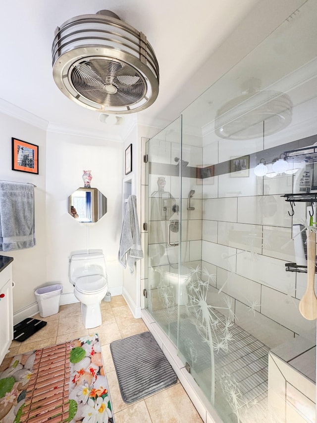400 Warioto Way Unit 716, Ashland City, TN 37015 - bathroom featuring baseboards, a stall shower, toilet, ornamental molding, and tile patterned flooring