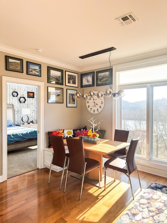 400 Warioto Way Unit 716, Ashland City, TN 37015 - dining room with crown molding, wood finished floors, plenty of natural light, and a mountain view