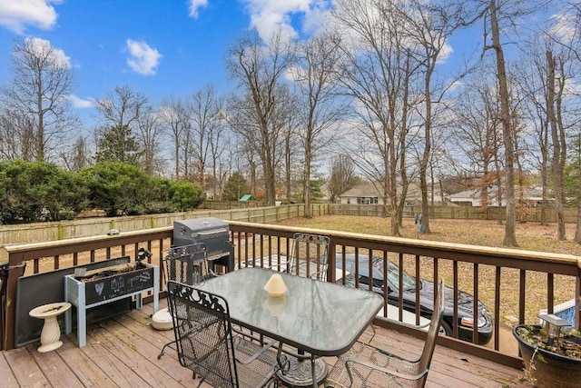 wooden deck with area for grilling