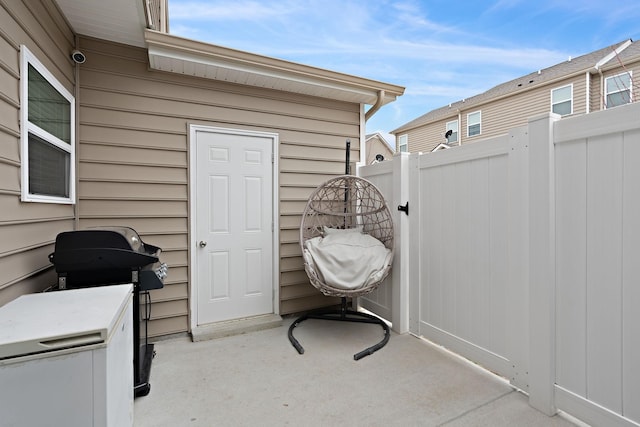 view of patio with a grill