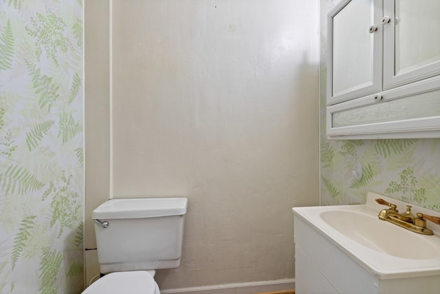 bathroom featuring sink and toilet