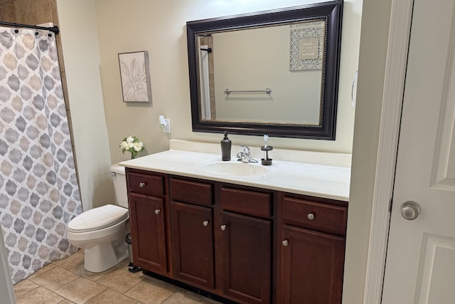 bathroom featuring vanity, tile patterned flooring, curtained shower, and toilet