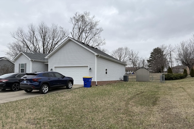 view of side of home with cooling unit, a garage, and a lawn