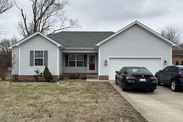 single story home featuring a garage and a front yard