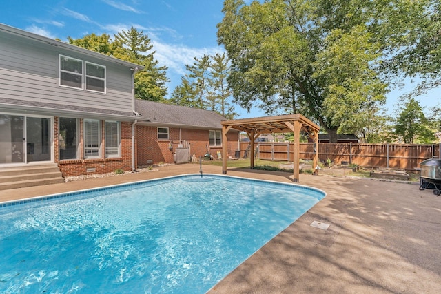 view of swimming pool featuring a pergola and a patio