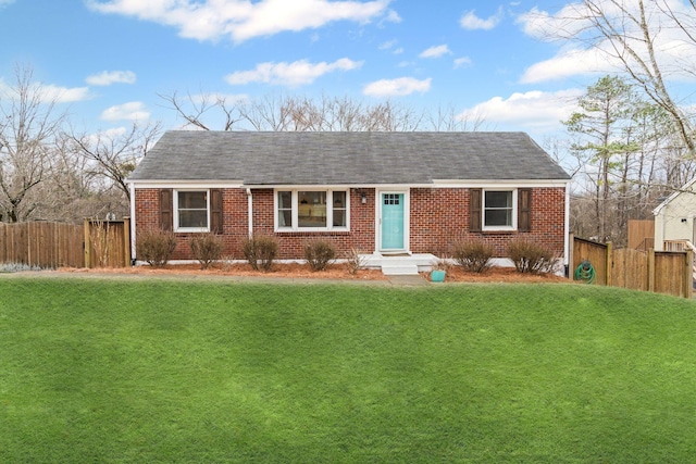 ranch-style house featuring a front lawn