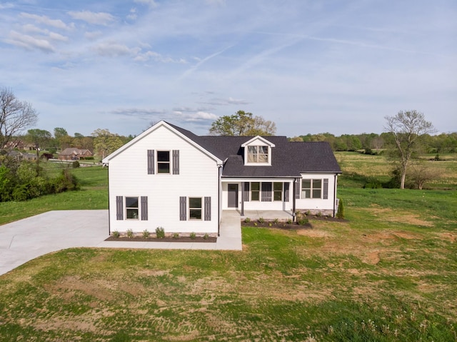 view of front of property with a front lawn