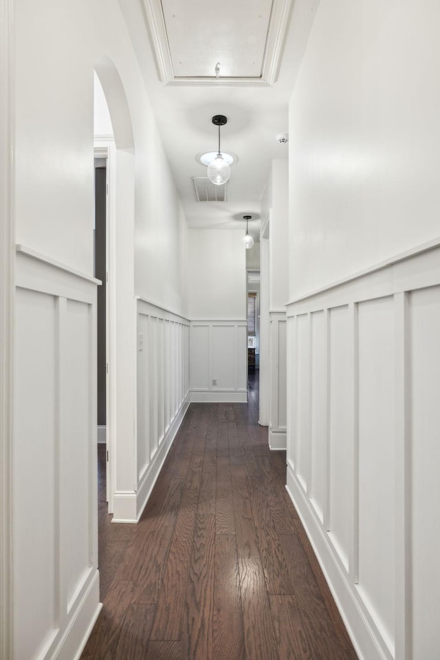 hall featuring dark wood-type flooring