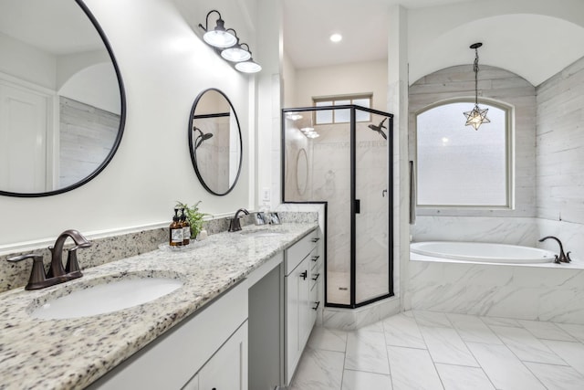 bathroom with vanity and plus walk in shower