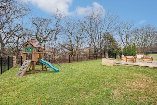 view of yard with an outdoor hangout area, a patio, and a playground