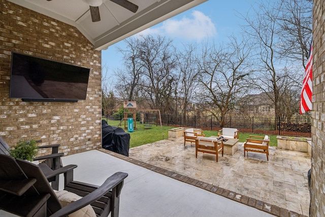 view of patio featuring ceiling fan, an outdoor hangout area, and a playground