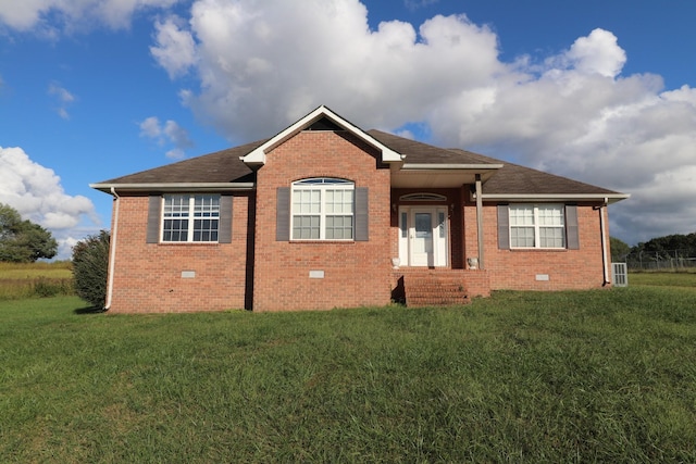 view of front of property with a front lawn