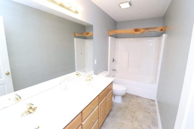 full bathroom with vanity, bathtub / shower combination, and toilet