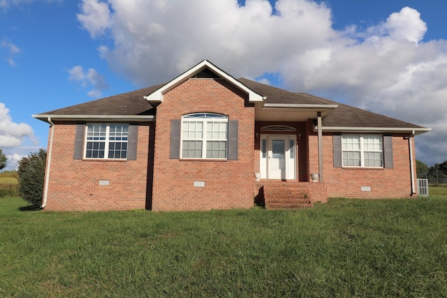 view of front of home with a front lawn