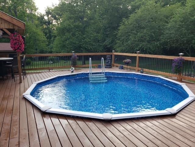 view of pool featuring a deck