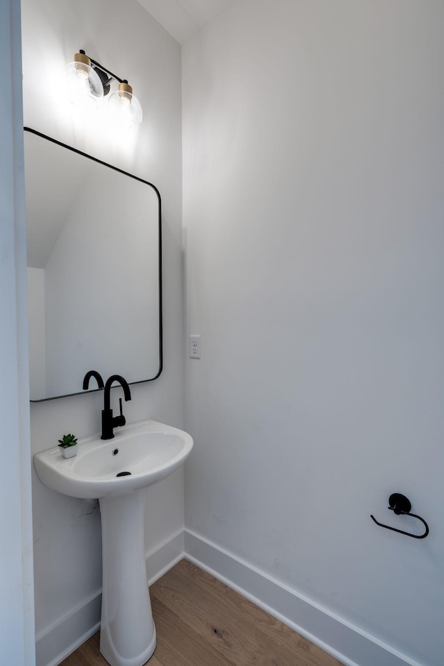 bathroom featuring hardwood / wood-style flooring