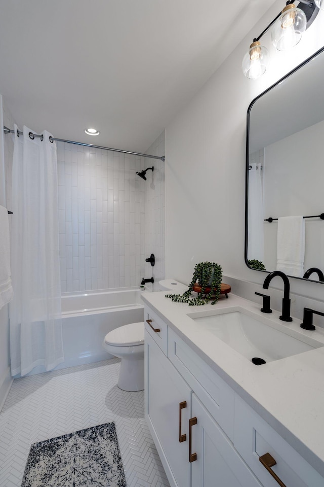 full bathroom with vanity, shower / bath combination with curtain, tile patterned floors, and toilet