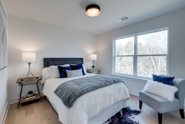 bedroom featuring hardwood / wood-style floors